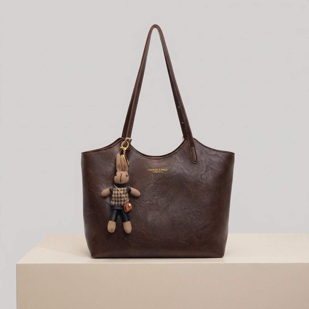 Damen Veganleder Tote Bag mit Plüsch-Anhänger Schultertasche