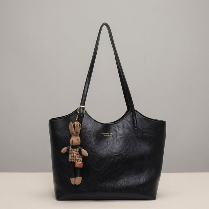 Damen Veganleder Tote Bag mit Plüsch-Anhänger Schultertasche