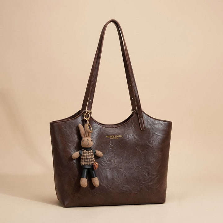Damen Veganleder Tote Bag mit Plüsch-Anhänger Schultertasche